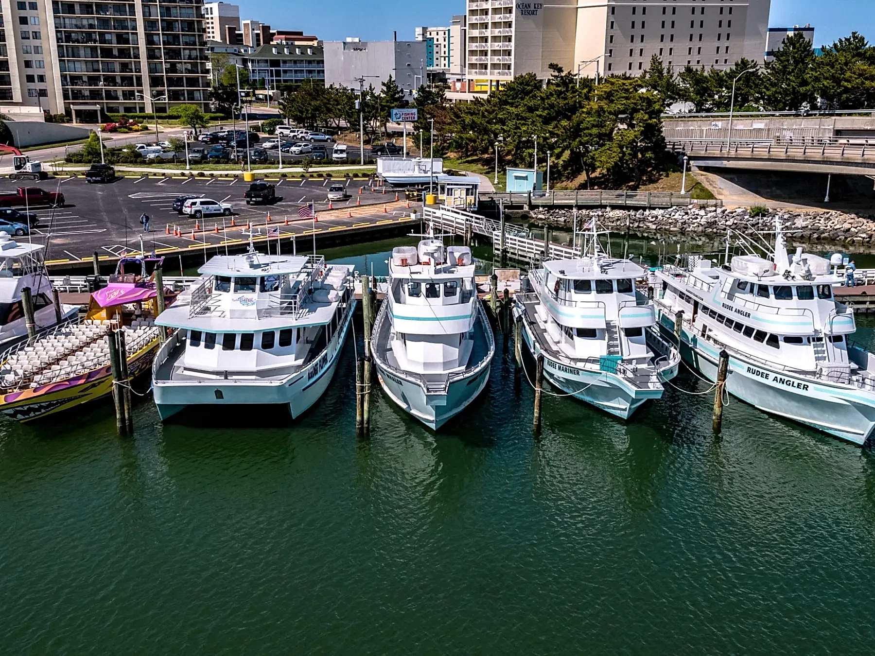 a boat is docked next to a body of water