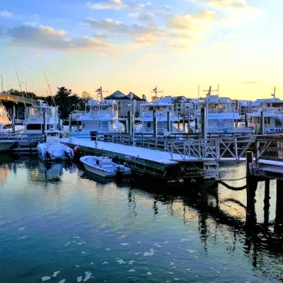 a boat is docked next to a body of water