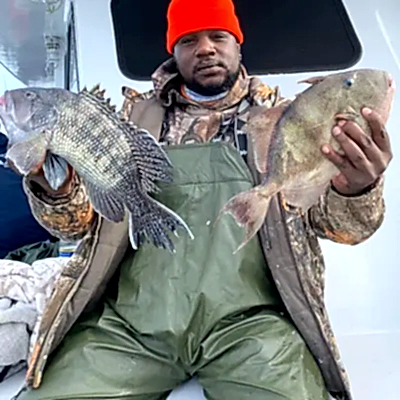 a man holding a fish
