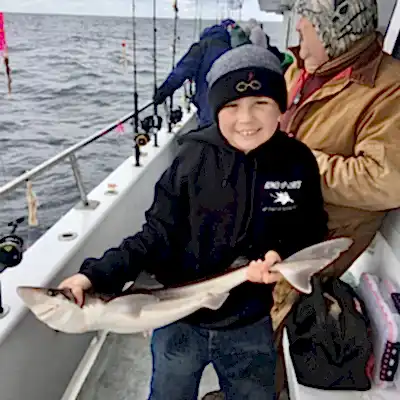 child with small shark